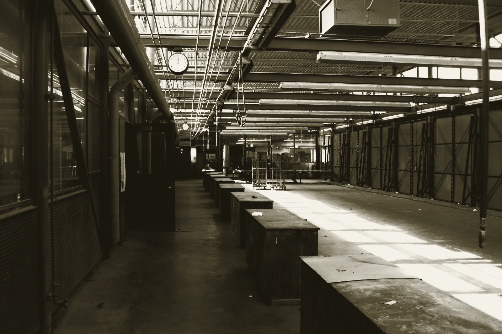 Inside the completed Auto Technology Center: service bays under exposed structural steel