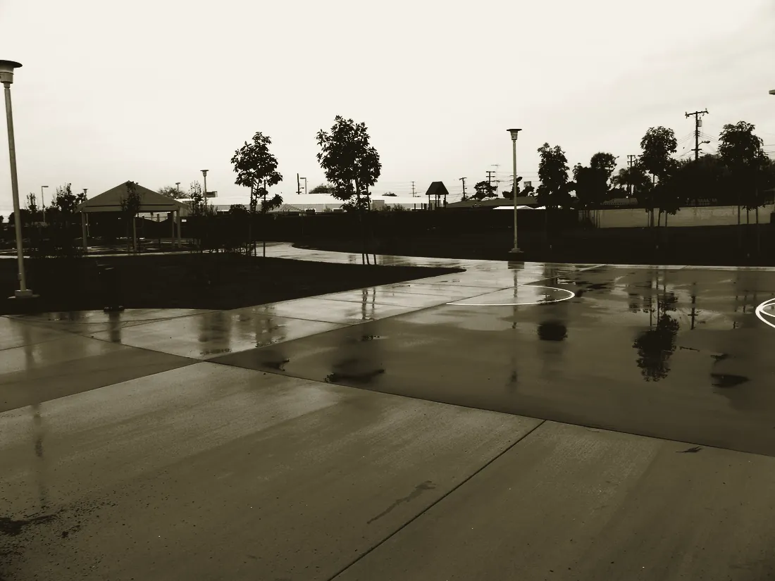 Newly poured concrete plaza and pathways through the park
