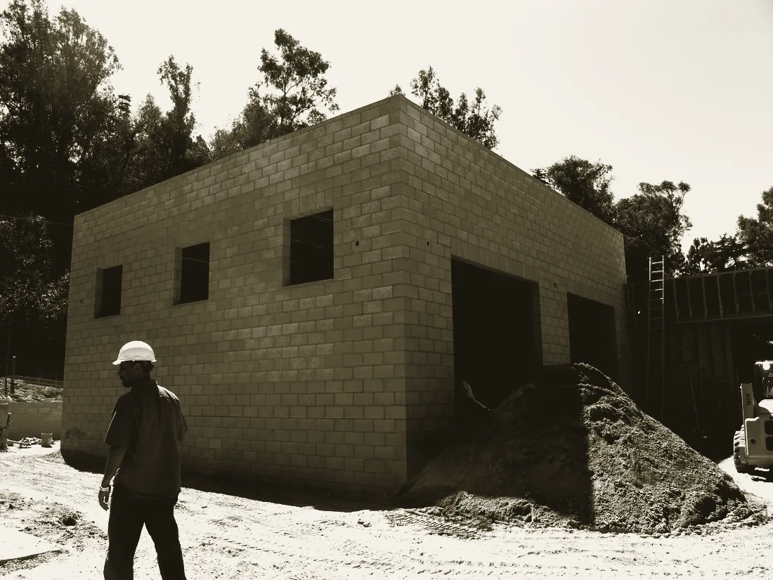 Richman Park community building under construction, concrete block walls up