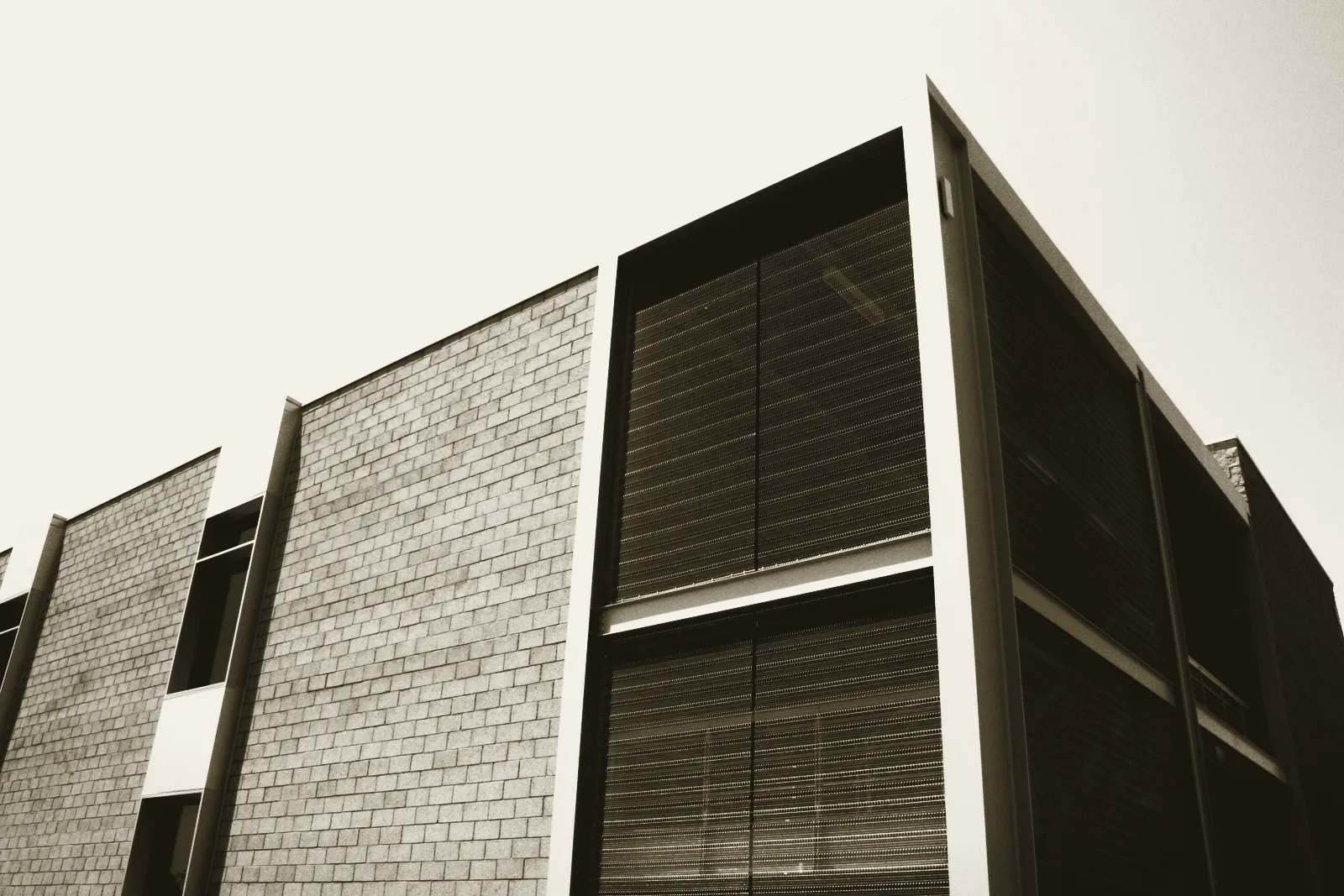 The completed Santa Ana College classroom building, masonry facade with projecting screened bays